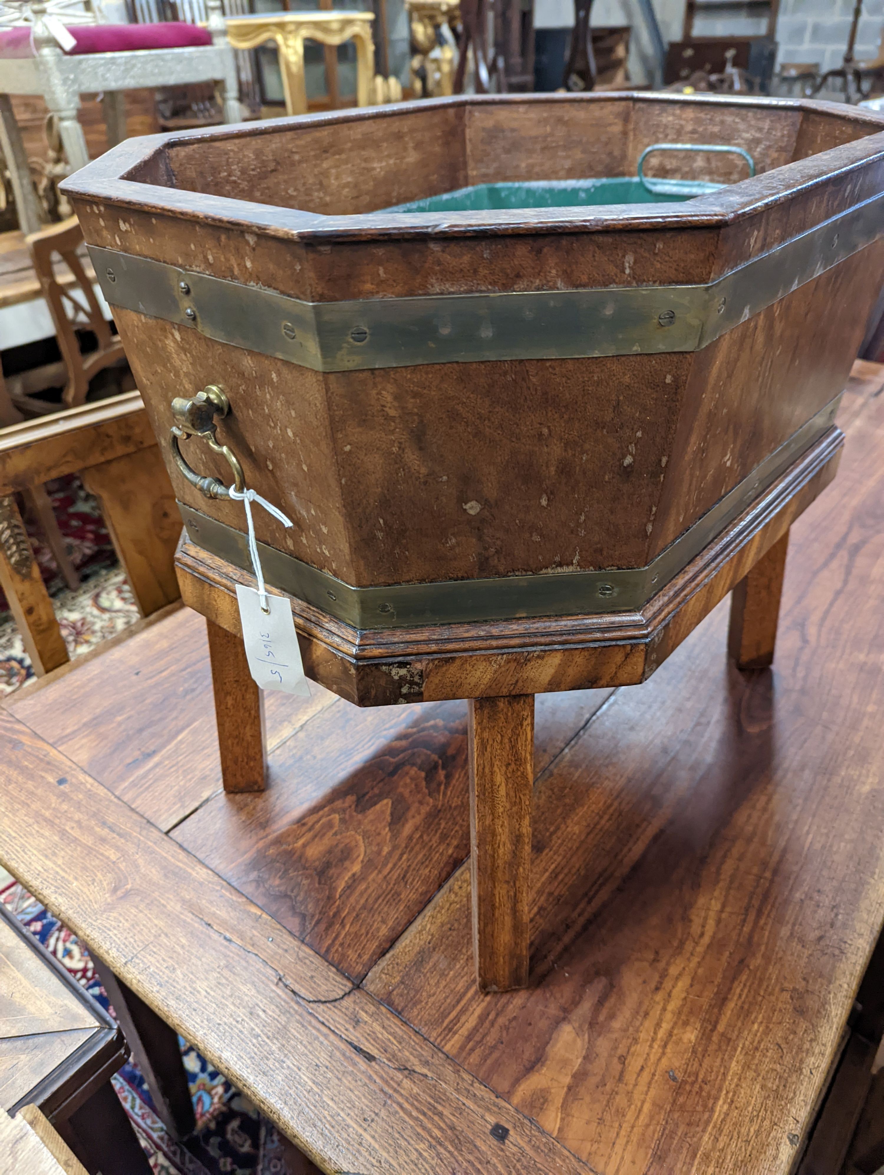 A George III style octagonal brass bound wine cooler. W-55cm, D-40cm, H-49cm.